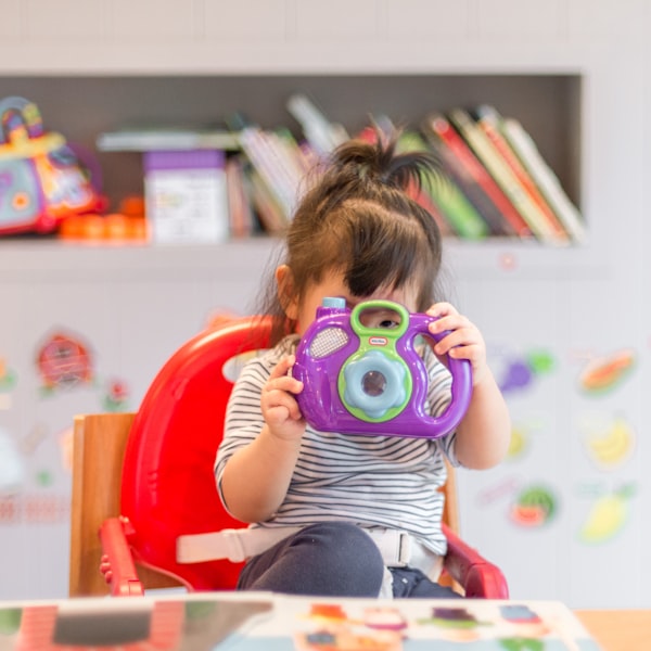 Children working with hands-on materials in a Montessori-inspired classroom